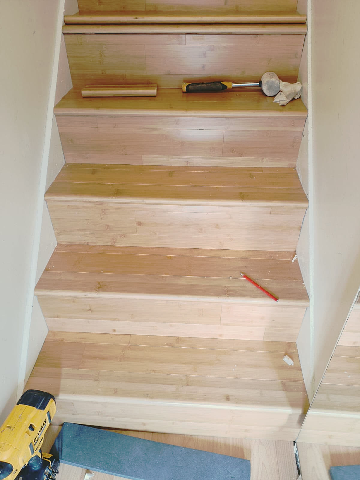 New wooden treads and risers fitted on a staircase