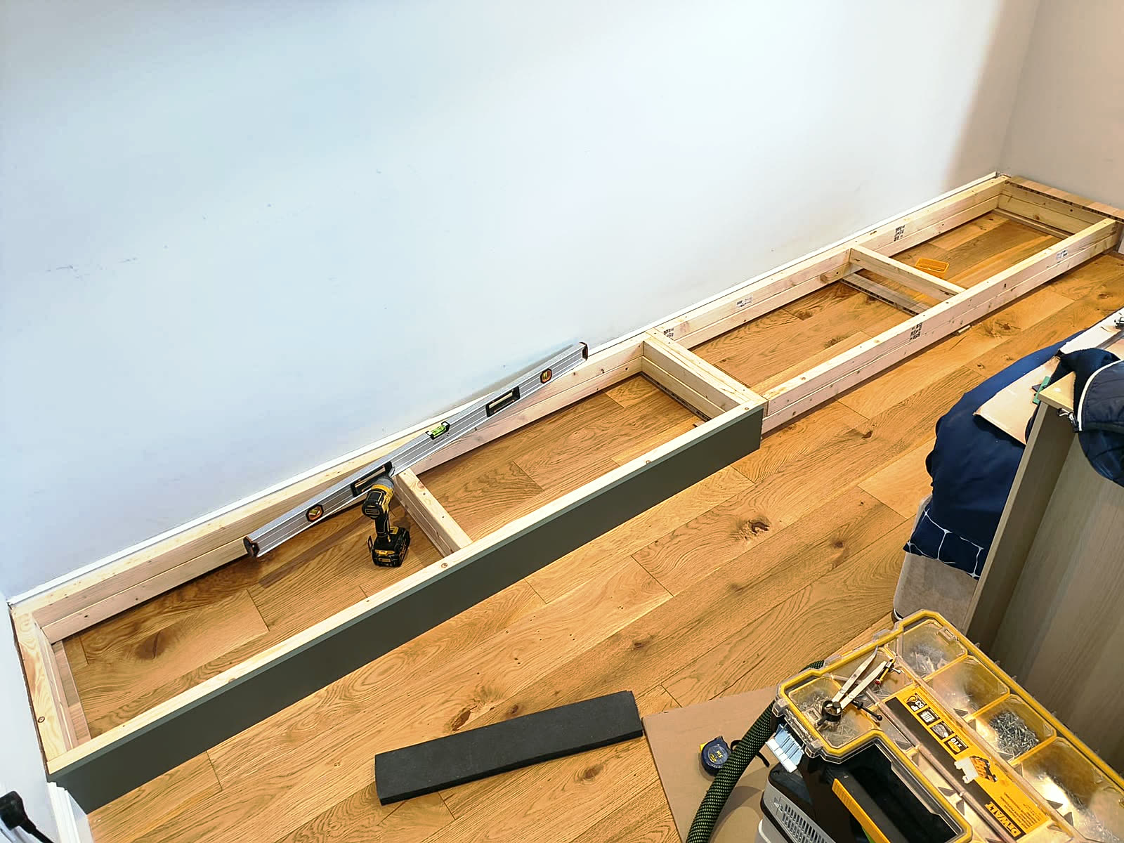 Levelled plinth built for fitted wardrobes
